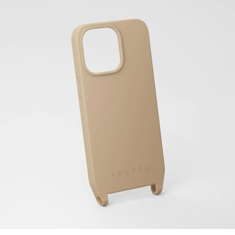 XouXou phone case with strap accessories. Brand New. Sand color. iPhone 14 Pro